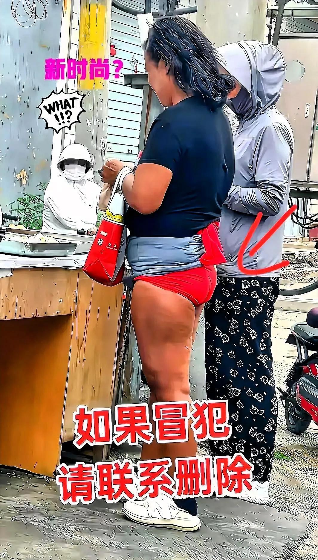 姑娘穿红内裤直接上街，还站了整整90秒，路人手机举得跟森林似的，有人喊酷有人摇头
