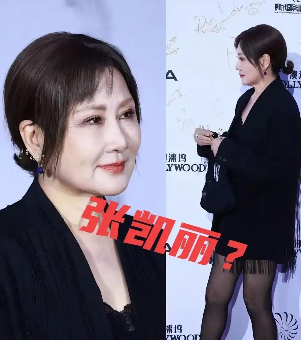 张凯丽最近火了。六十二岁的人，换个造型直接刷屏。
 
她剪了高马尾，穿黑西装超短
