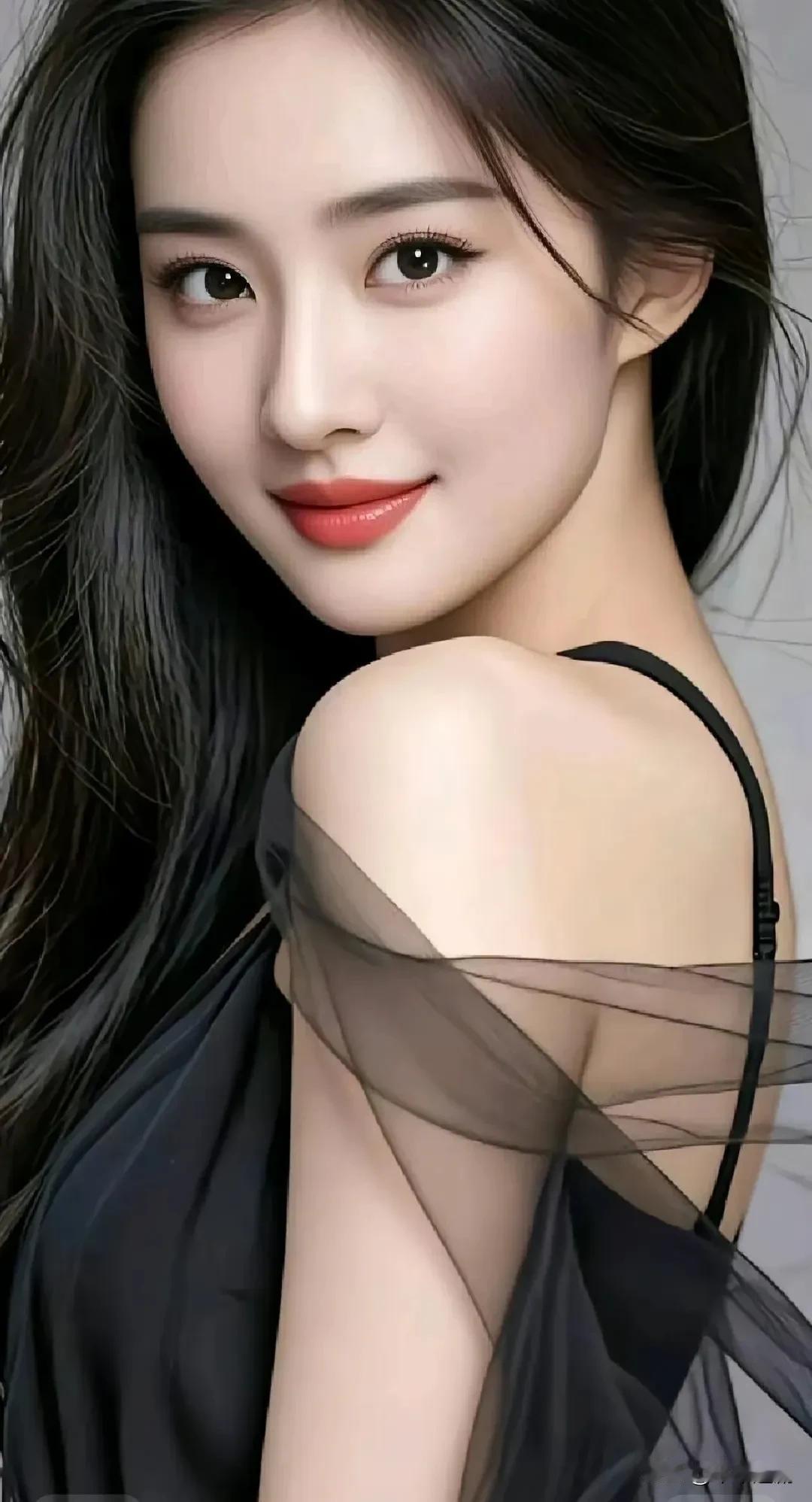 什么是真正的女性之美?
长发漫过肩线，薄纱裹着轻软的风。唇上那抹红，是恰好落在眼