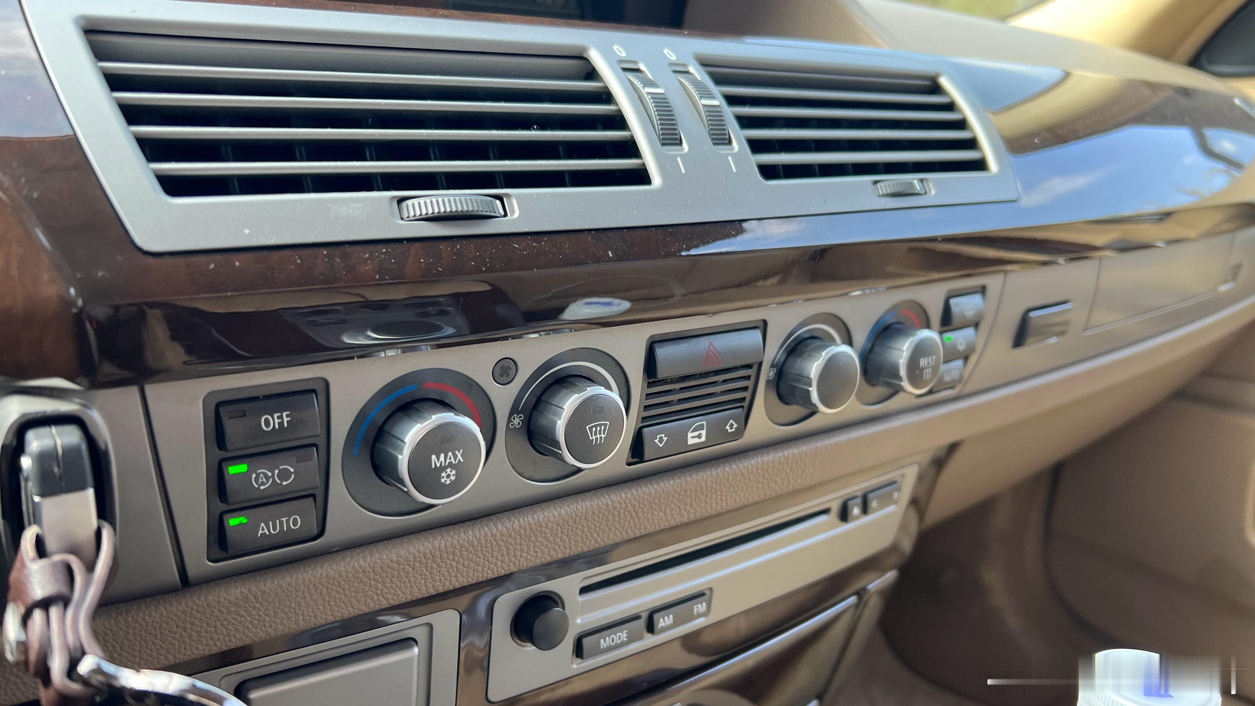 E66这个空调按键，搞得我以为是自动启停