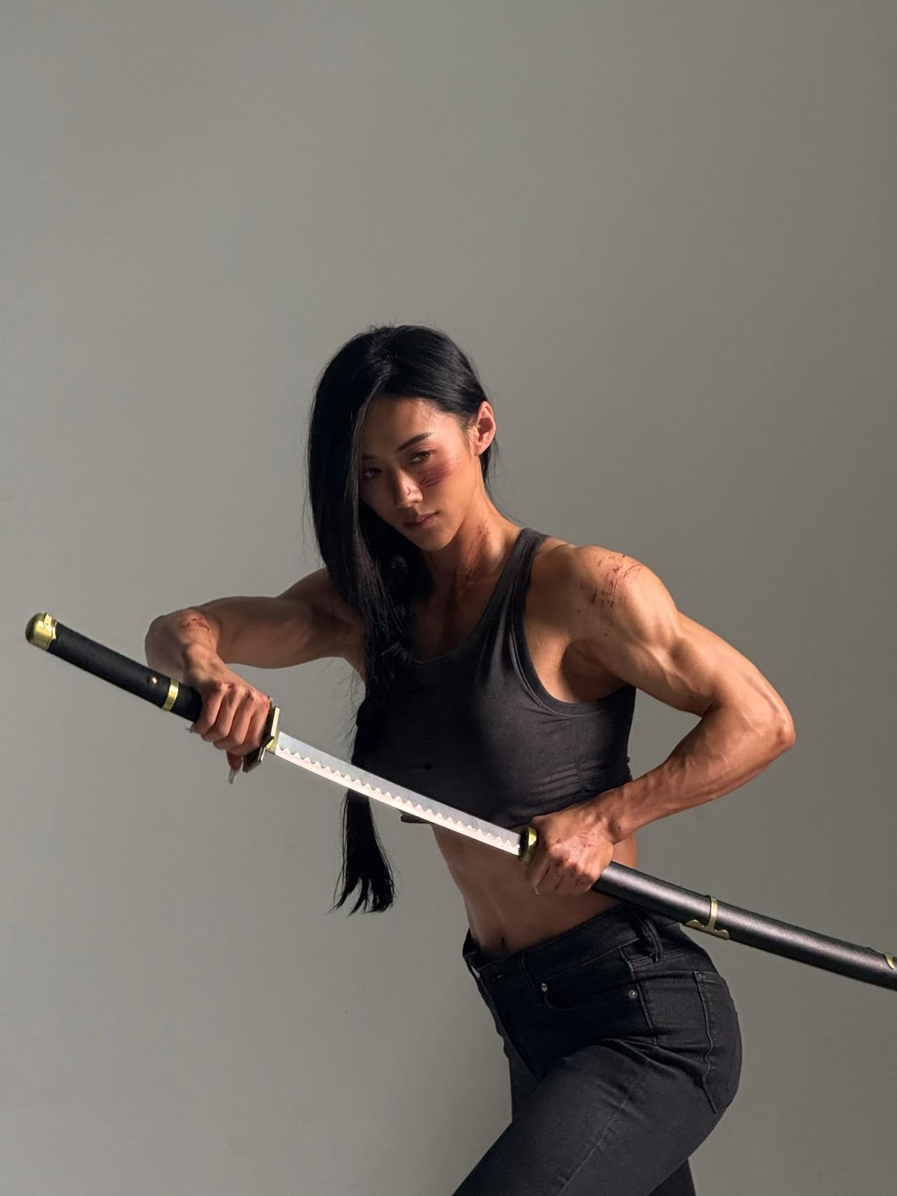 中国内地的IFBB（國際健身健美總會）女子形体健美职业选手：秦笛【拿铁笛子】；