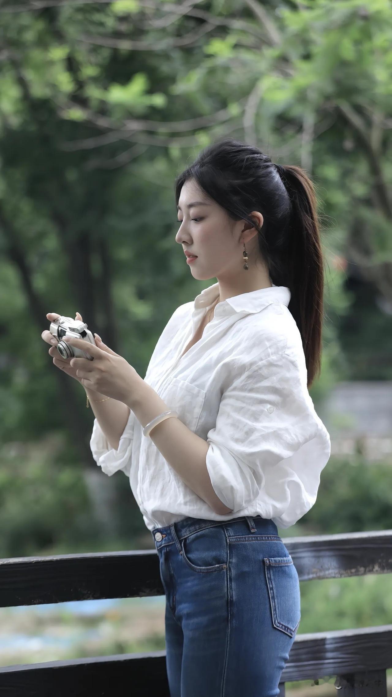 杭州雨中美景儿...