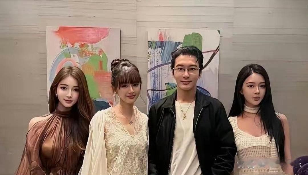 48岁黄晓明与26岁女友胡冉儿同游新加坡环球影城，引发关注。胡冉儿身穿米白蕾丝长
