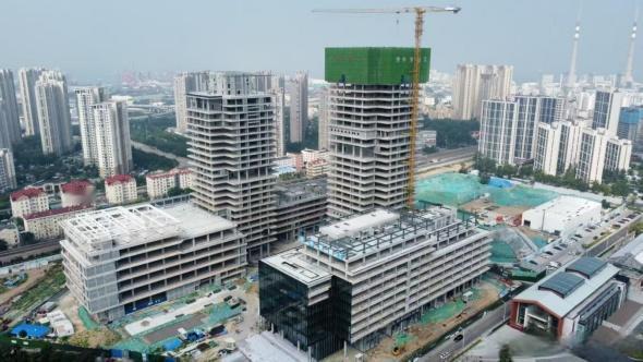 一线新闻眼｜玻璃幕墙现代感十足，中车四方智汇港进度更新，承载老工业区升级使命
市