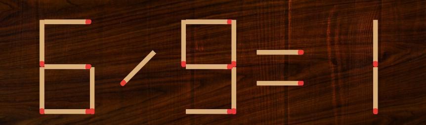 画面中，一根根火柴错落有致地组成了错误算式 “6÷9＝1”。一眼便能看出，这个除