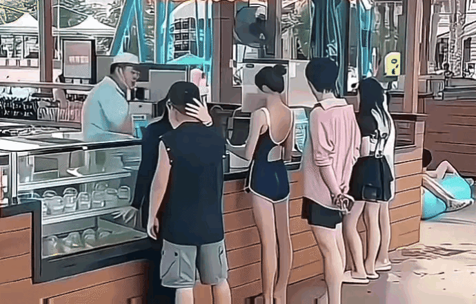 店主小哥的眼神，充分说明了他此刻的内心