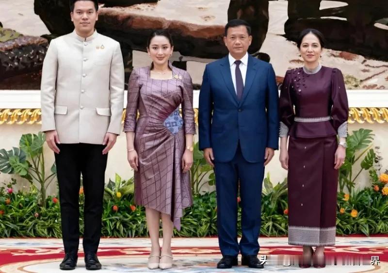 佩通坦和洪玛奈的妻子站在一起，基本是完胜，不管是身材，还是气质，两个女子都不是一