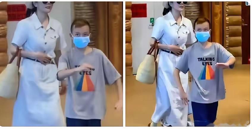 杨乐乐带儿子“小沐沐”外出被拍，这孩子现在已经11岁了，看他的眼神和行为举止确实
