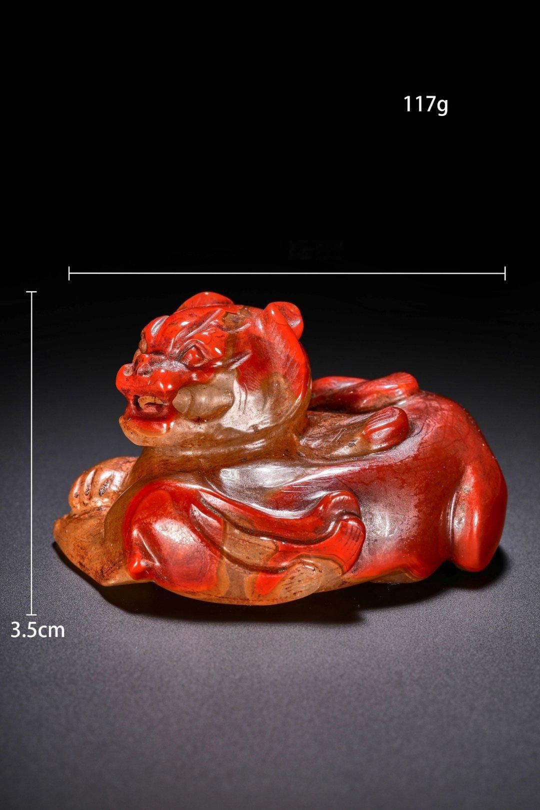 高古玉 大小合适，红缟玛瑙兽，年代；汉，包浆润泽亮丽，雕工利落，形象可鞠。仿品几