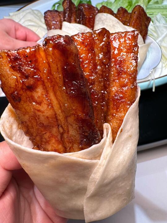 （南京）临走还包个抓手上吃的…