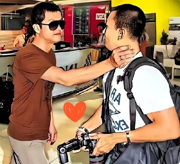 李亚鹏怒如护崽的雄狮，单手抵住凑上前拍李嫣的娱记，红着眼嘶吼的模样，直到现在看仍