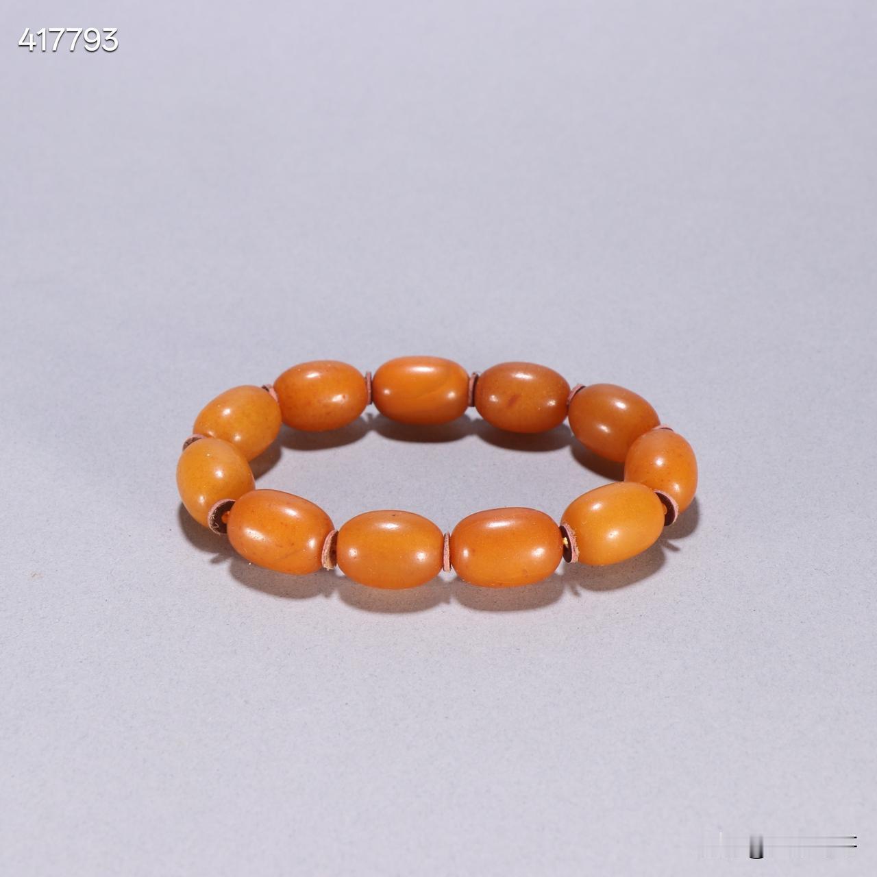 清 蜜蜡枣珠手串
规格：宽1.7×1.2cm