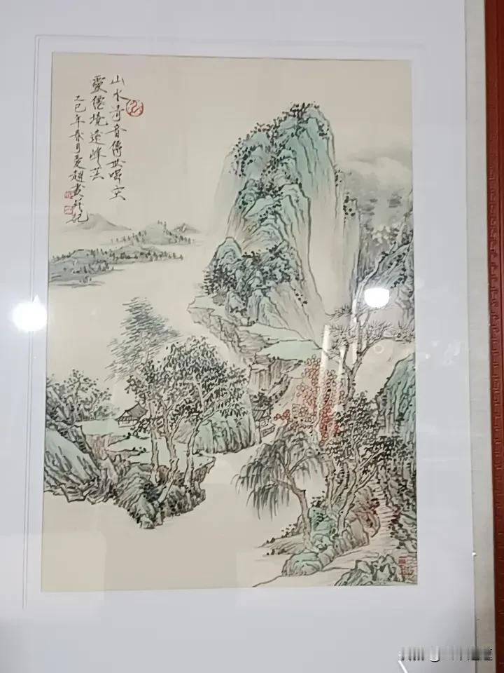 看到这幅传统的山水画，仿佛踏入一个宁静悠远的世界。连绵起伏的山峦，用墨色的浓淡勾