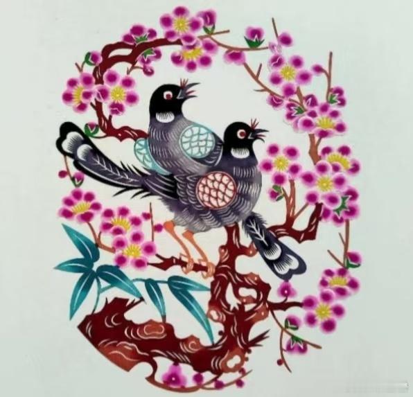 文化中国行 剪纸作品《梅枝双鹊鸣春》：“梅枝”点明花枝背景，“双鹊”对应两只喜鹊