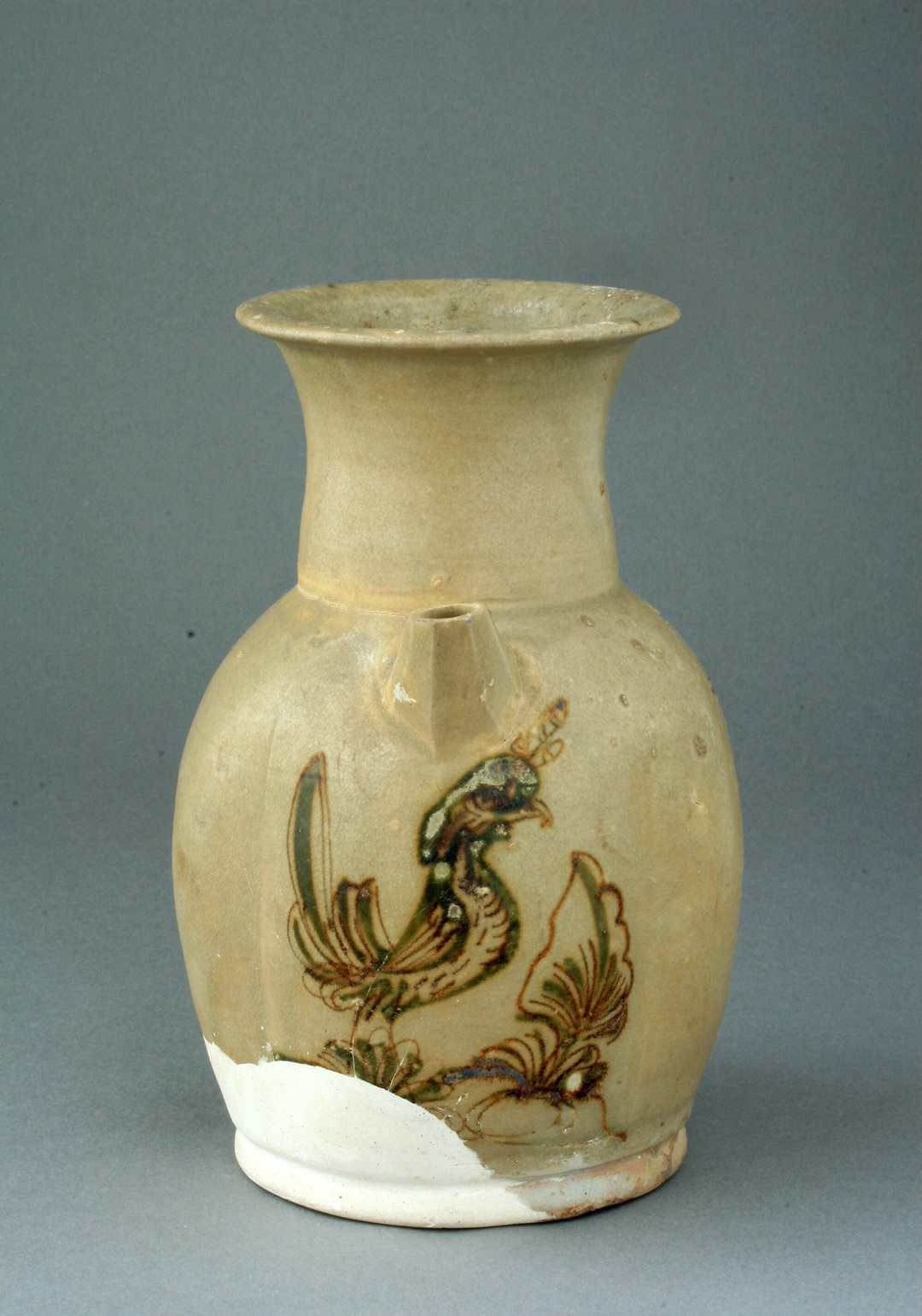 唐·长沙窑青釉褐绿彩凤鸟纹执壶 | 湖南省博物馆高19.1cm；口径9.3cm；