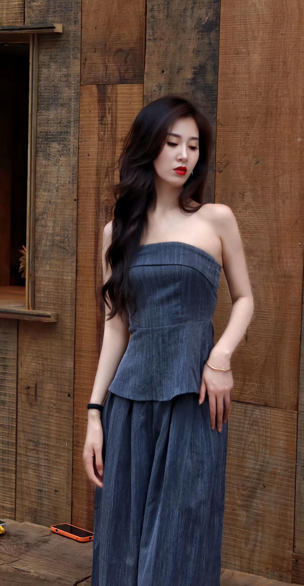 她是谁？