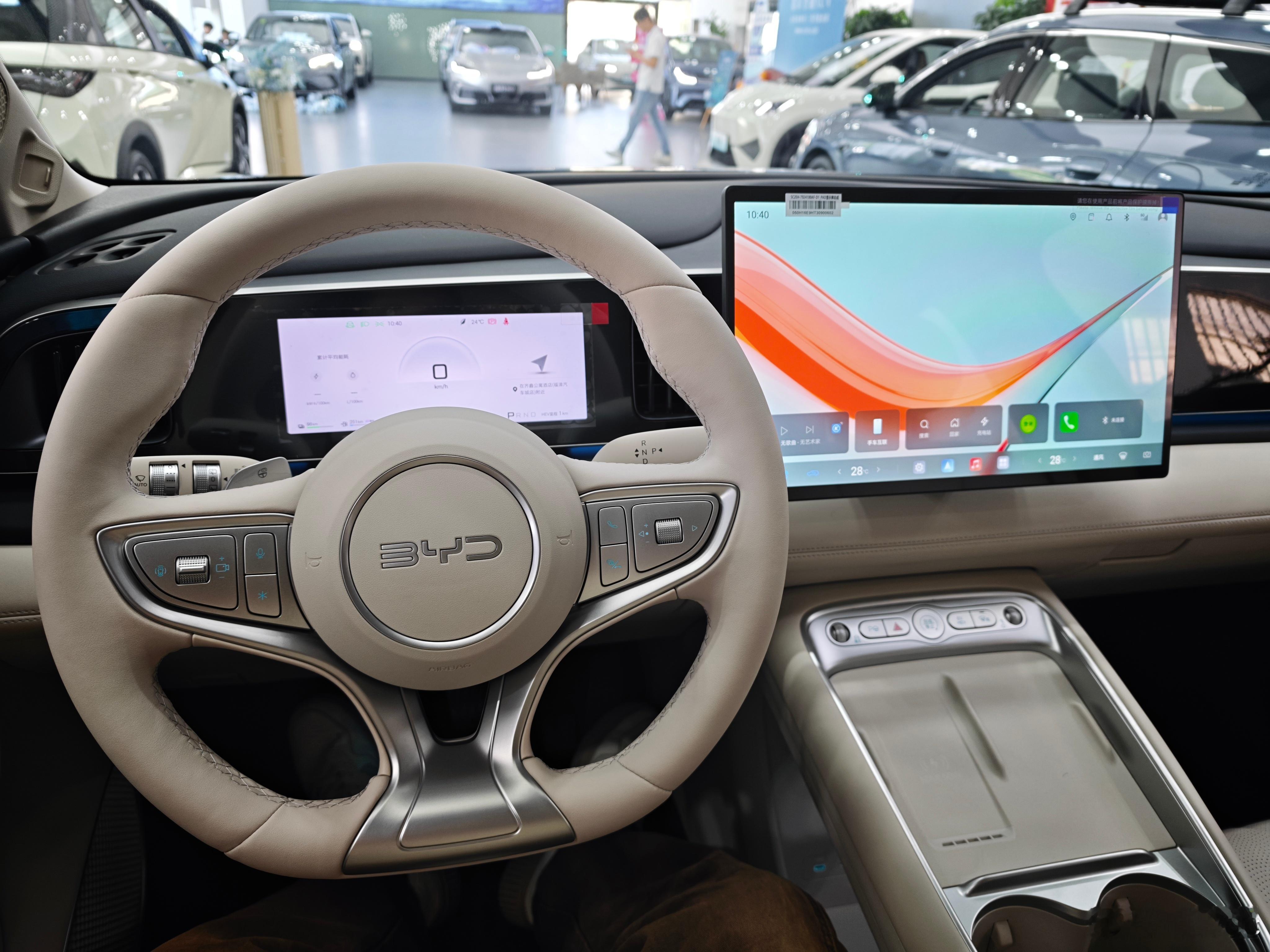 真有点意思看起来质感很不错后排也很舒适内饰设计和配色也好 