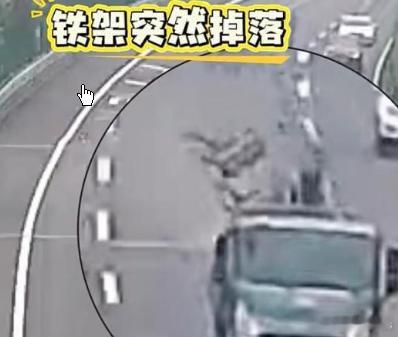 高速上徒手拖走80斤铁架司机找到了,幸好王建国力气一直不小，他利用肩部的力量，把