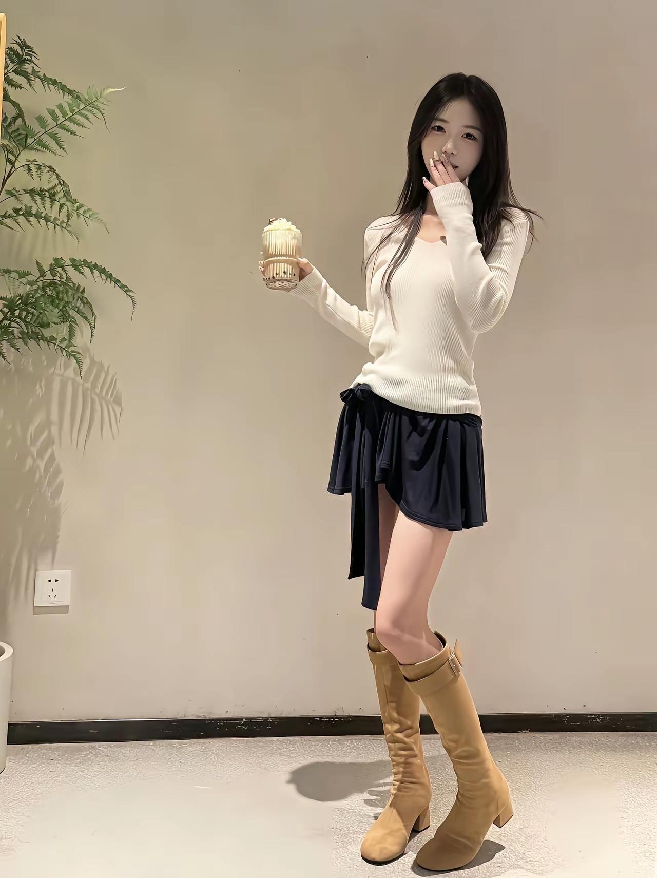 冬日穿搭指南：温暖毛衣+时髦短裙+复古靴子，尽显甜美与时尚！