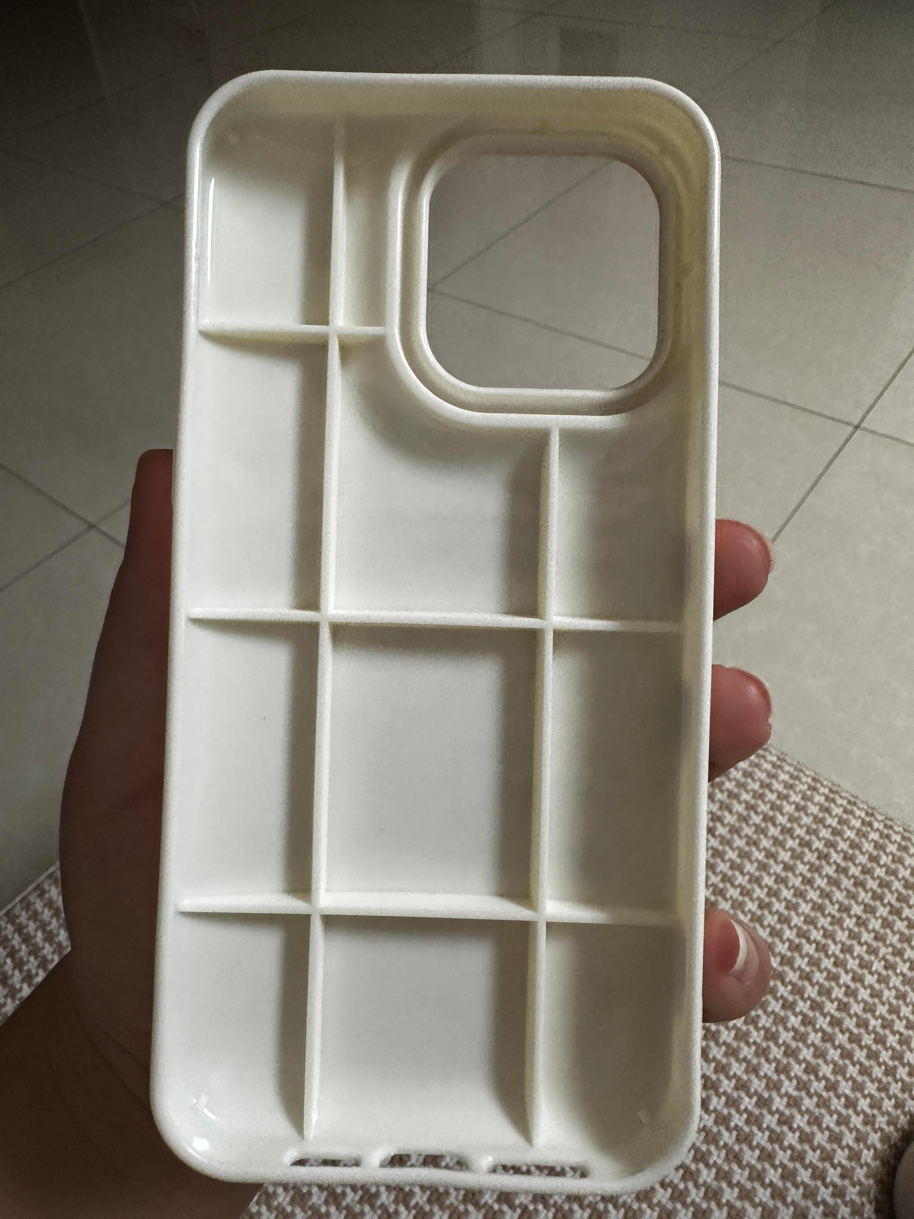 这手机壳的格子凹陷的作用是？ 
