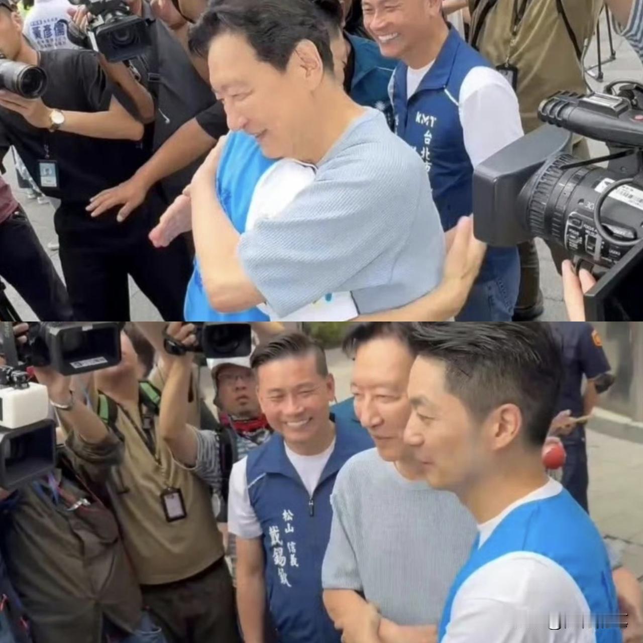 赵少康与蒋万安拥抱，在大庭广众之下拥抱，在摄像头面前拥抱。

两人都很开心，笑容