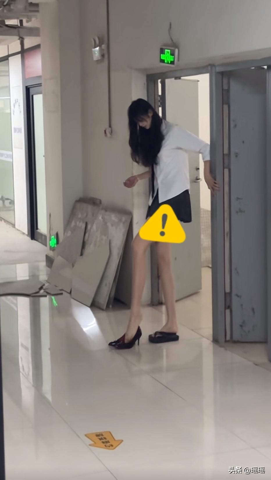 穿上高跟鞋有两米多了