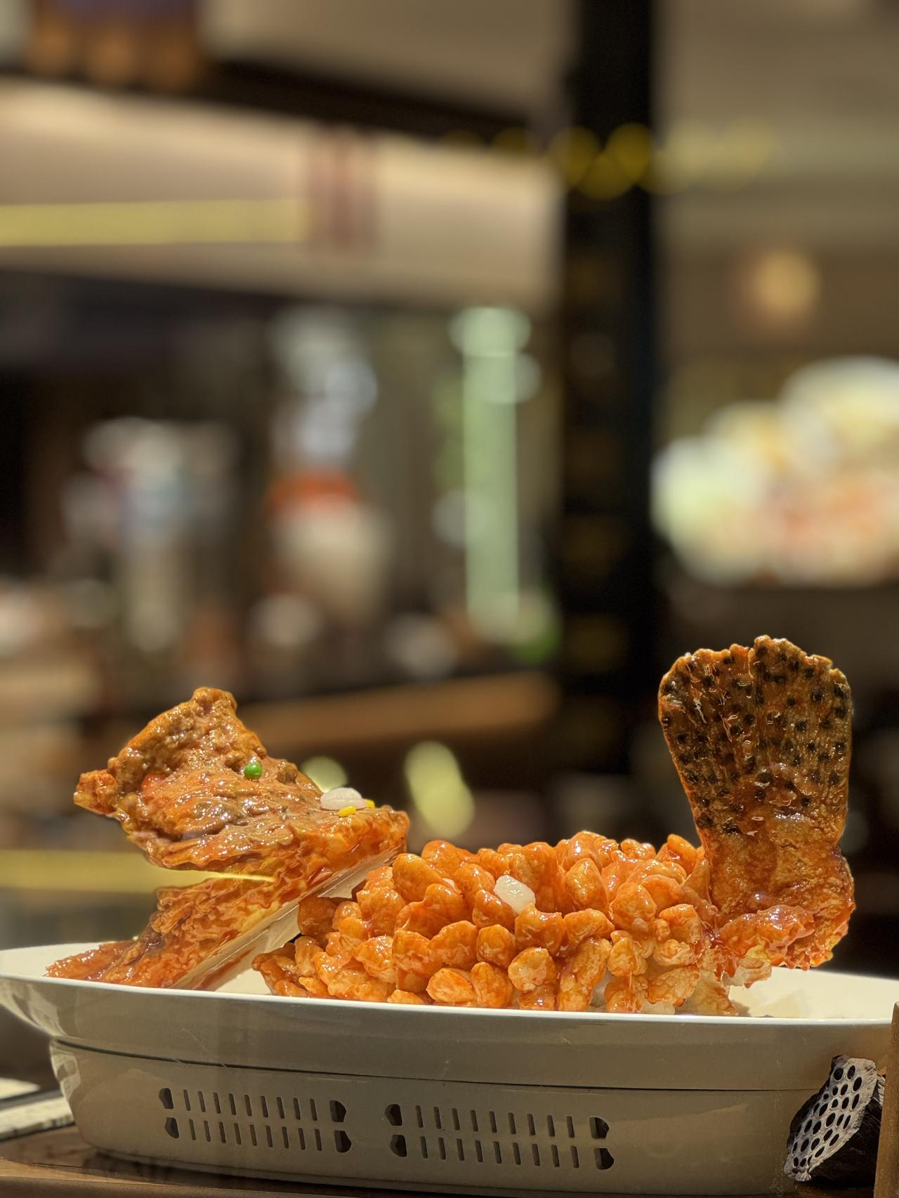 一人分享一副摄影作品苏州美食名菜松鼠鳜鱼。以前是名菜，现在大街小巷大大小小菜馆到