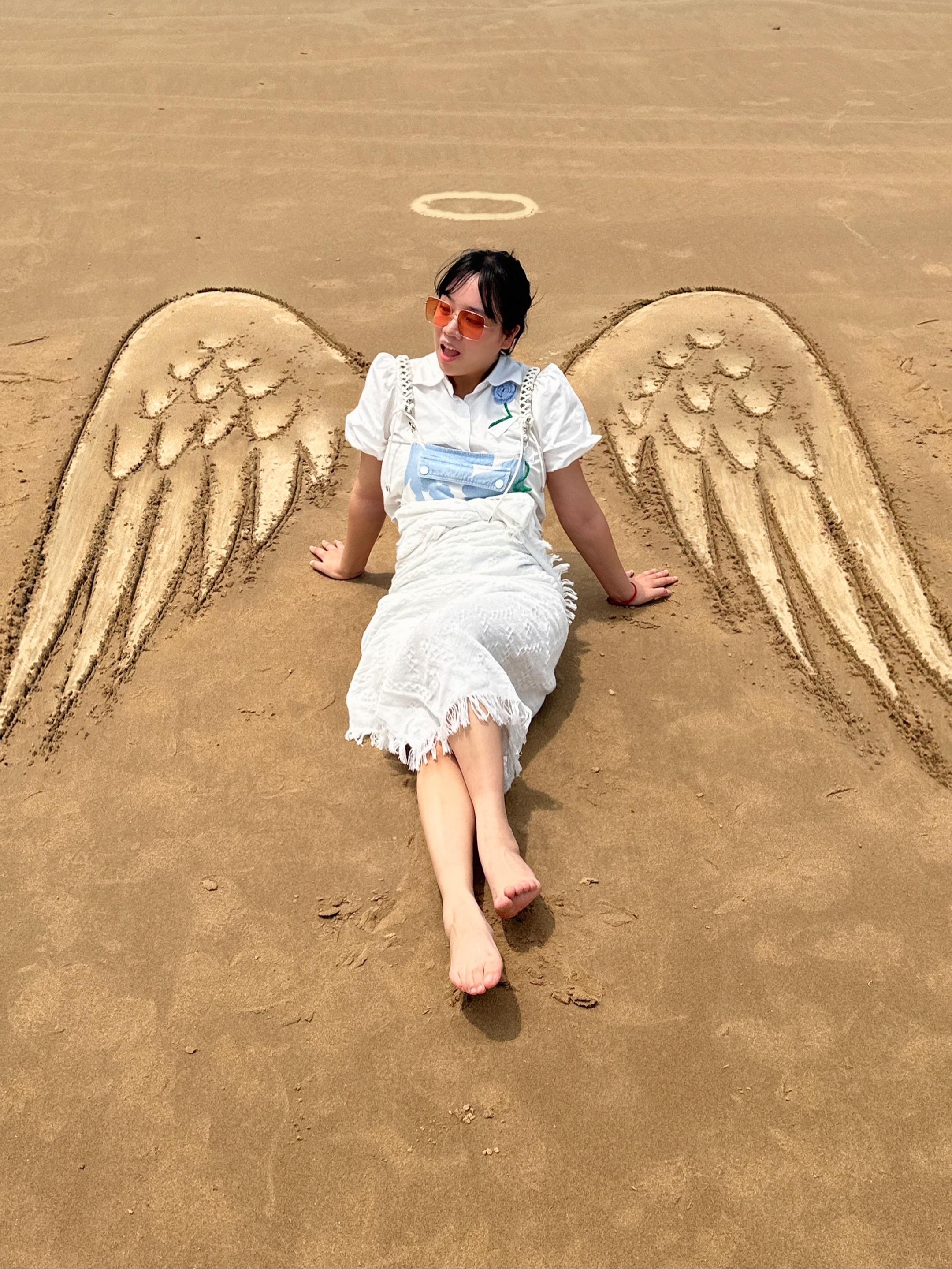 解锁沙滩拍照新姿势！🏖️📸。