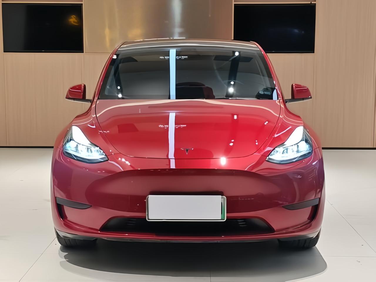 标题：Model Y 2022款后轮驱动版，4年7万公里红色，现在卖大概15万-