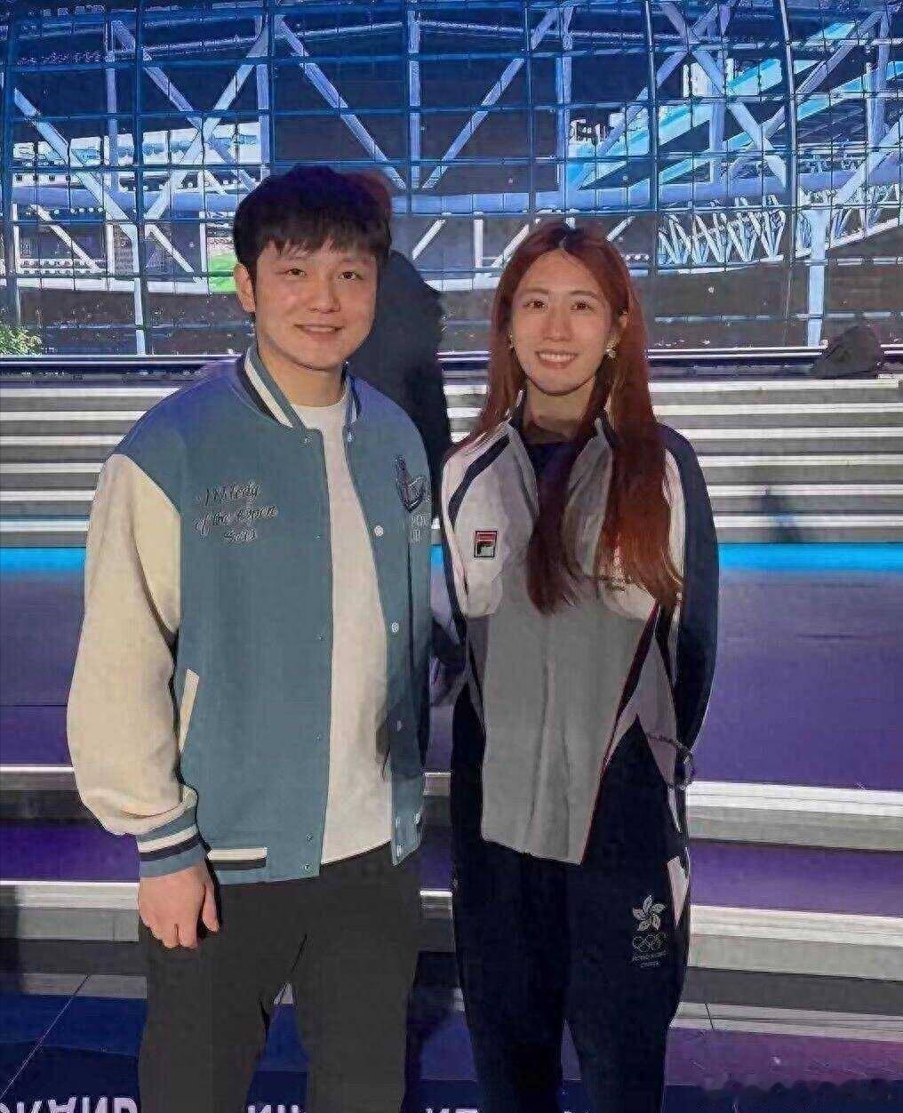 樊振东不怕流言蜚语，继续和小朱合影，所以小朱配文：Respect------全运