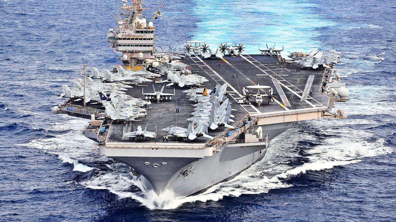 双航母阴影下的抉择：美军在中东重建“战争级”空中力量，白宫站在开火与谈判之间。