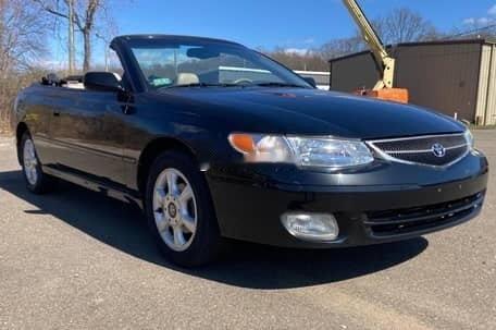 敞篷凯美瑞，还是个3.0V6的，这是2001年在饿迈瑞啃上的牌，说是行驶了十一万