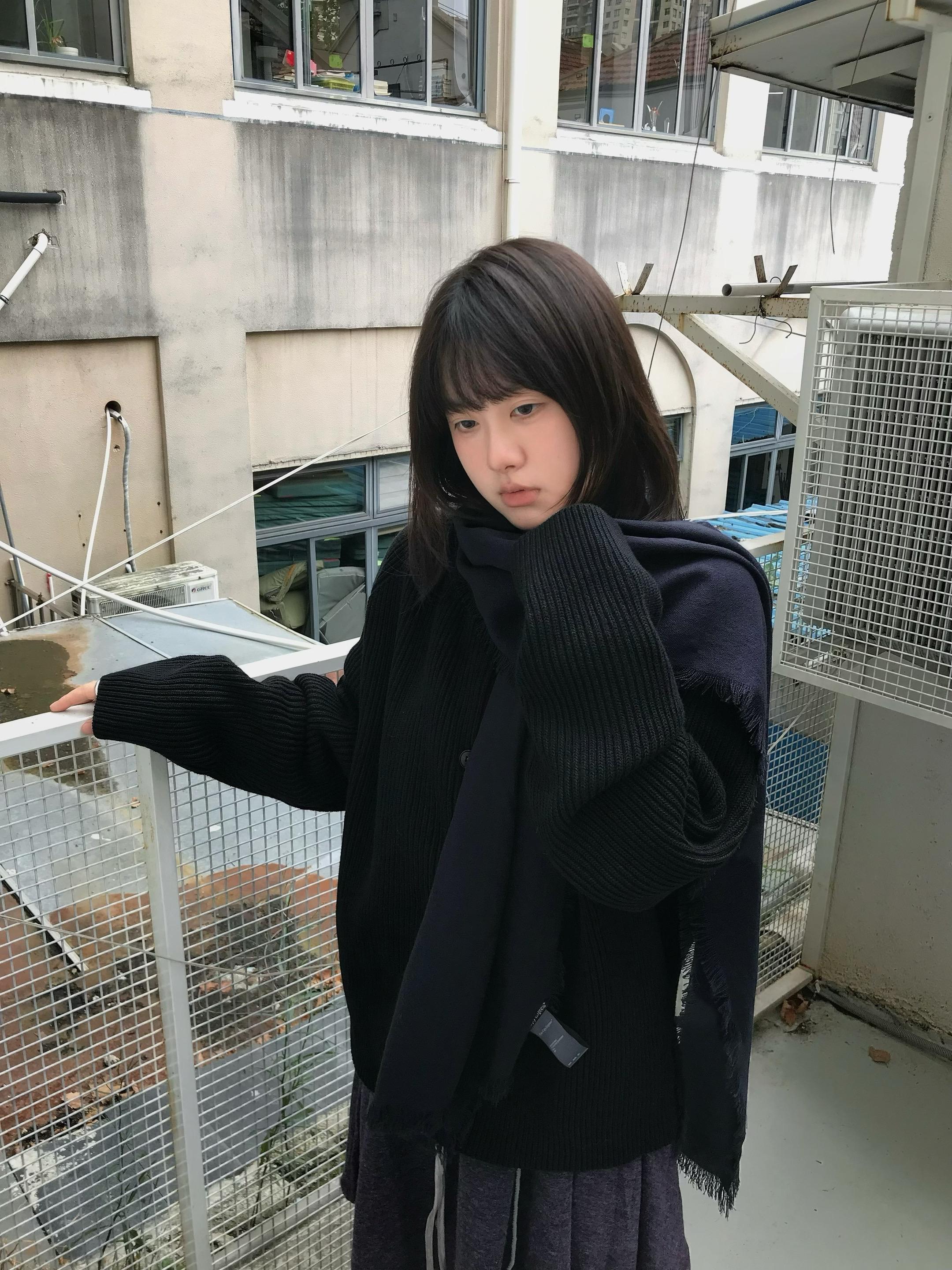 冷空气的气味 掺杂些许心碎。