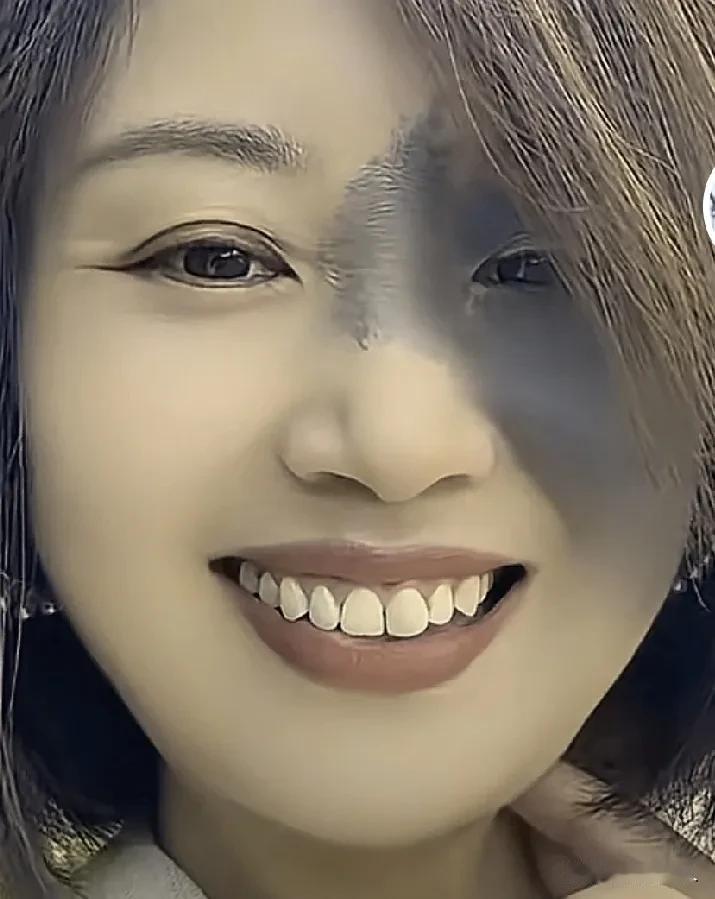 你能用最简短的文字来描述她的容貌吗？要抓得稳而准。无论什么形式都可以，所有评论一