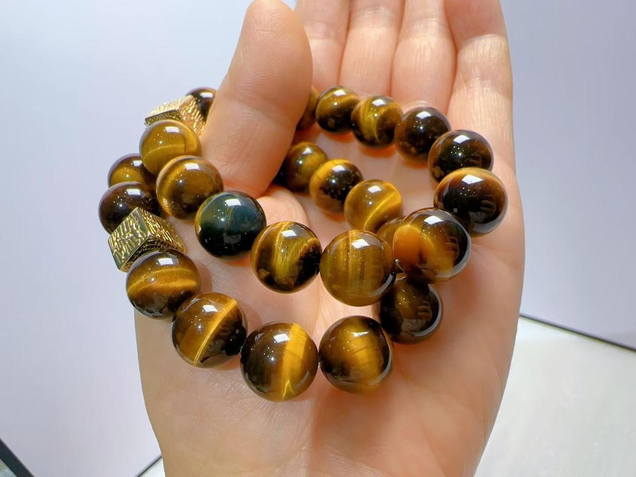 设计款黄虎眼石四方来财手串
能量贡献：超强吸金，落地显化，四方赚钱