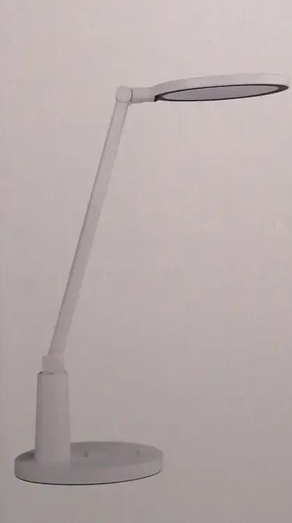 儿子买了一盏台灯，从快递驿站取回来，打开盒子看了看，觉得不满意，就堆放在杂物一起