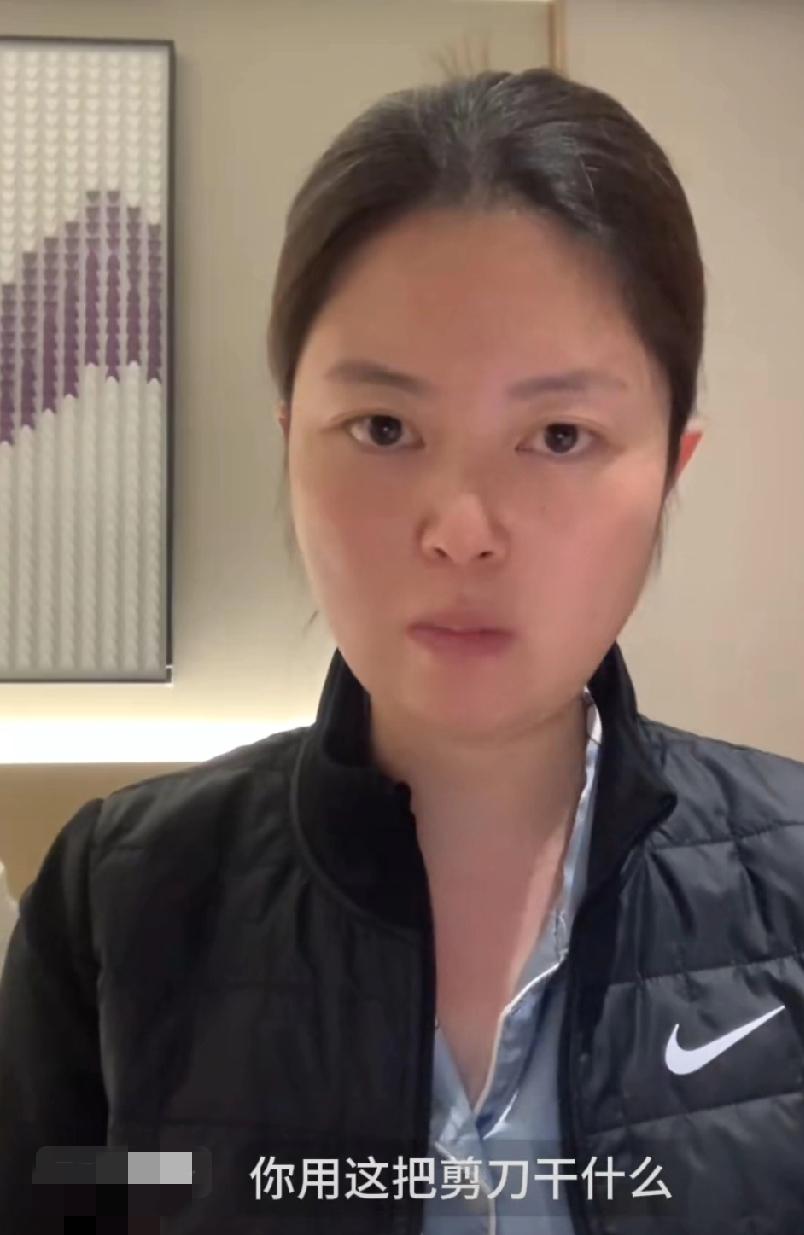 甘肃兰州，女子发视频吐槽：入住兰州某酒店，要剪刀剪衣服，遭高大男保安深夜守在门口