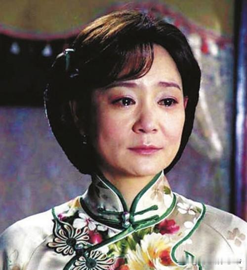 上联:愁愁愁愁容满面，
下联:乐乐乐乐在其中。