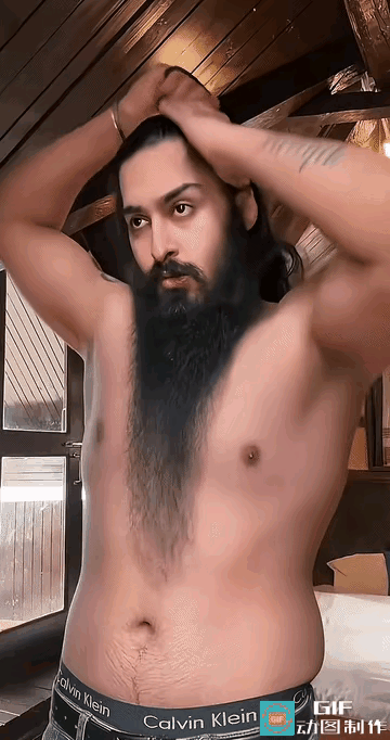 这个男子的胡子真漂亮，人长得也很帅气，在他没打扮之前，感觉会更好一些，但是认真打