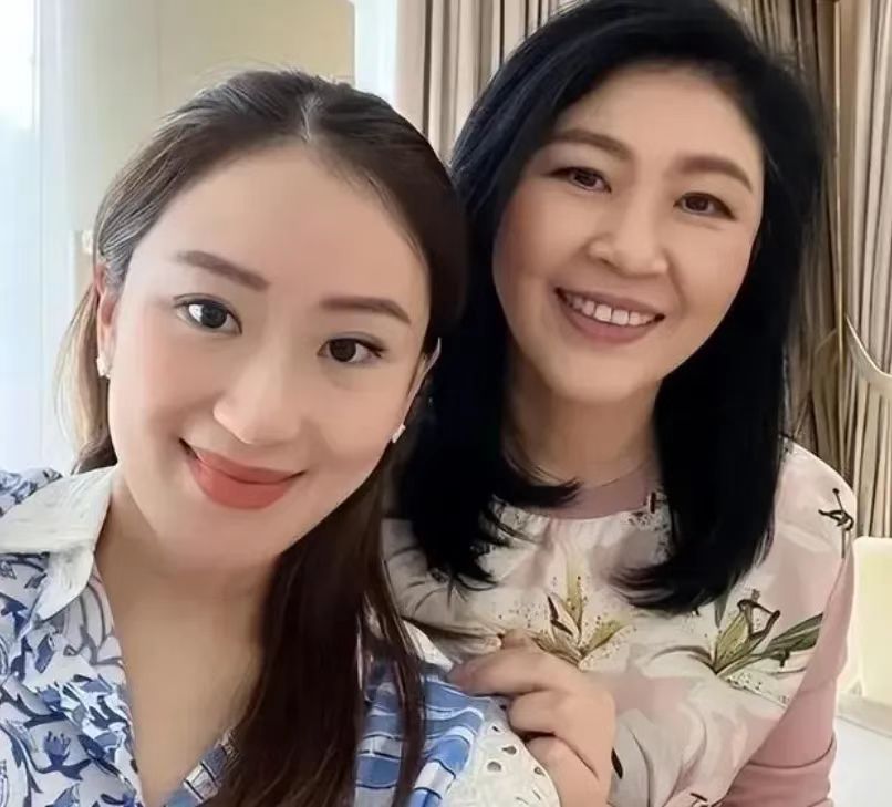 泰国现任总理东丹·西那瓦和泰国前总理英拉·西那瓦，英拉·西那瓦是泰国第一位女总理