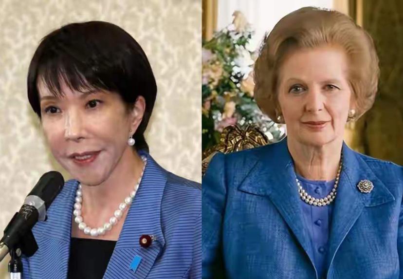 一个是英国首任女首相，
一个是日本人首任女首相

撒切尔夫人一袭蓝色西服套装，佩
