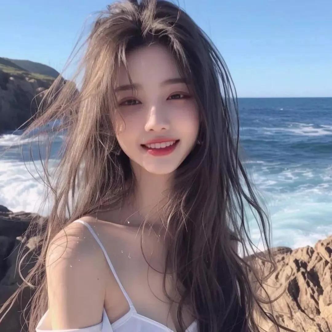 阳光沙滩，海风吹拂，笑靥如花。海边温柔风 海边游玩风 海边风照片 美女沙滩风景 