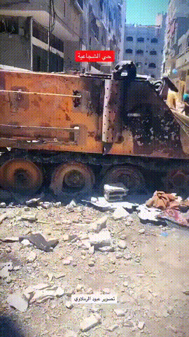 在加沙地区的大街上，有着许多的以军坦克残骸，加沙成为了以军的坦克坟场？
 
十分