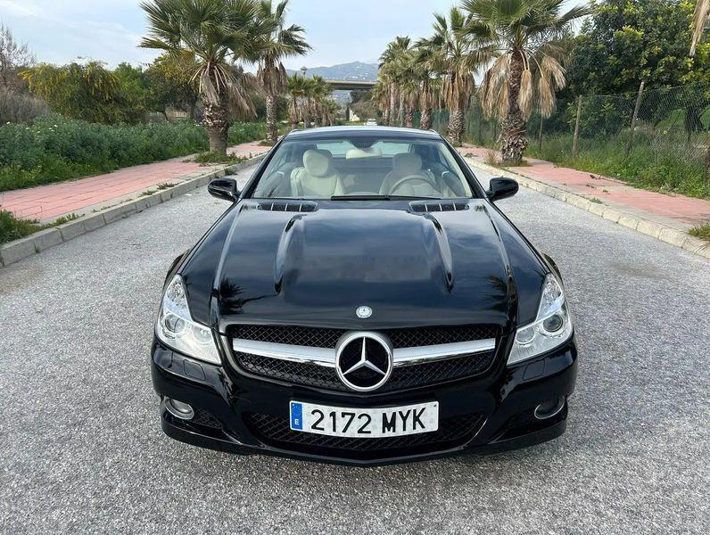 奔驰SL，这是2009年在西班牙上的牌，汽油自动挡，但是没说排量与车况，此车要价