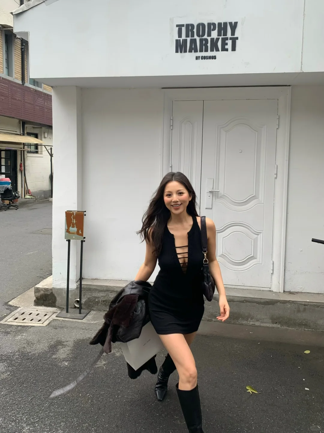 She is dressed in black