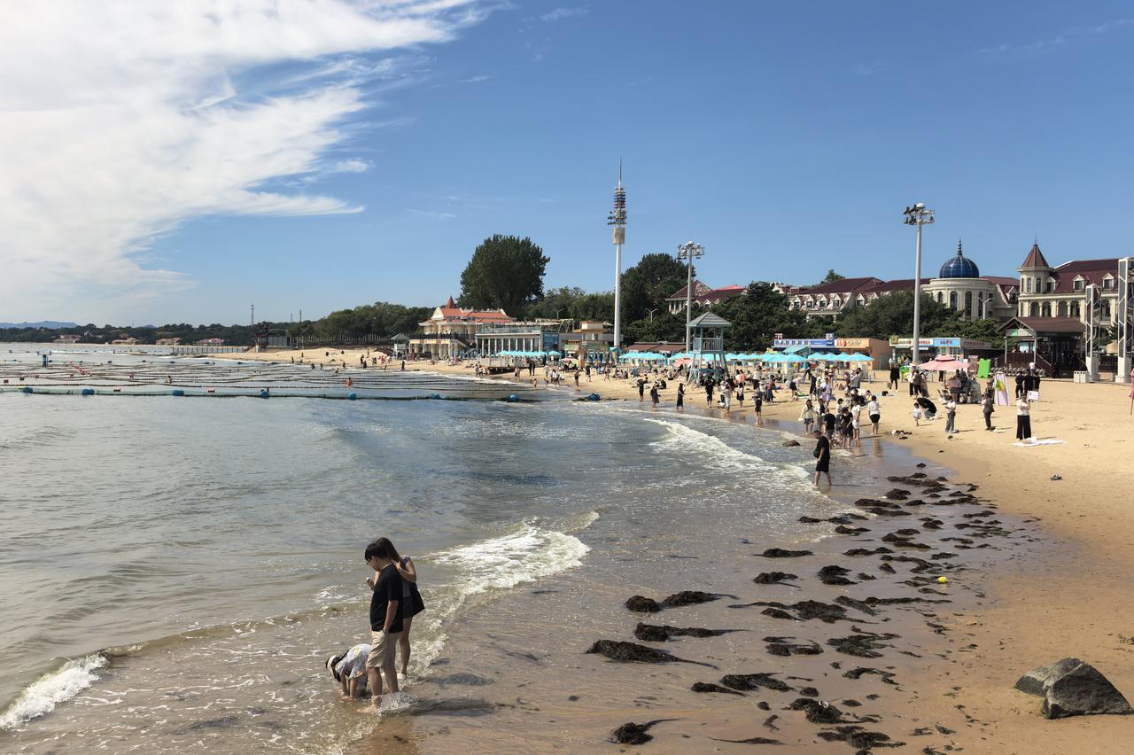 老虎石海上公园，遇见北戴河的夏日活力｜正午的老虎石海上公园，海风裹挟着大海独有的