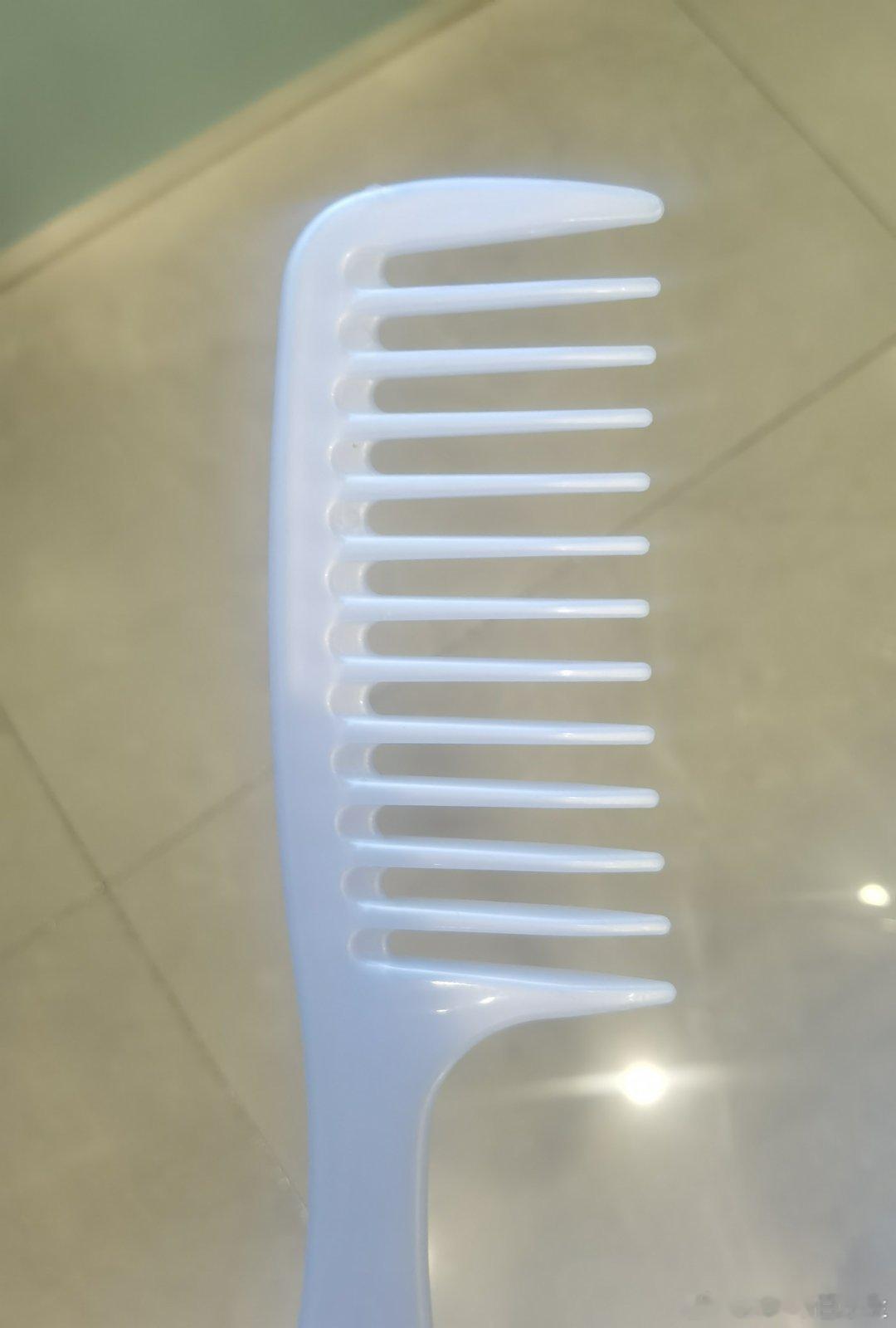又换了一把，这个梳子比较稀疏，试试能不能少掉点儿头发 
