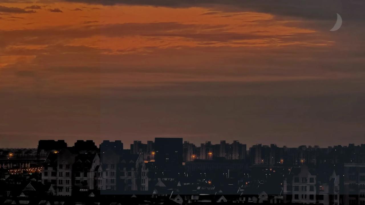 夜幕降临，苍穹如同巨匠泼洒的五彩画布，炫目夺魄。眨眼间，城市灯火次第亮起，犹如夜