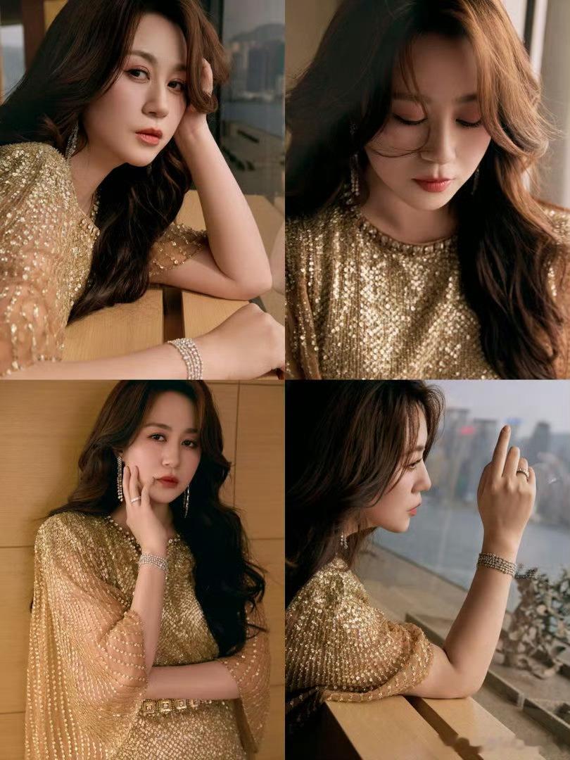 马丽港风鎏金造型马丽金像奖的大女主气场鎏金缀身，港风入梦，马丽在金像奖红毯上美出