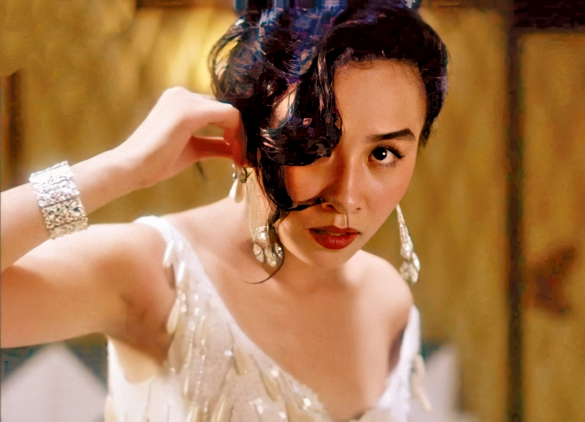 刘嘉玲 出演电影代表作中的剧照选按上映时序，图1~9分别来自：《阿飞正传》《阮玲